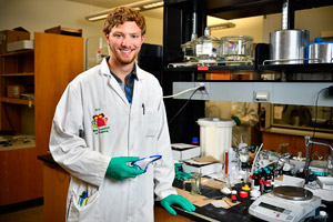 NSF-REU chemistry student Will Rackers in a chemistry lab